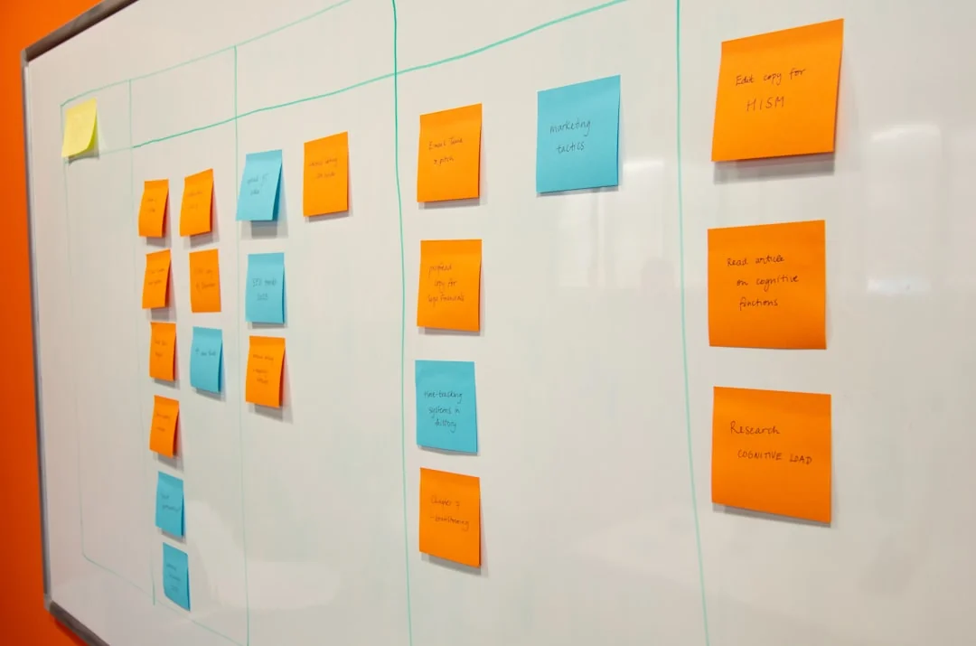 Aesthetic moodboard showcasing brand strategy concepts and design elements taped to a wall.